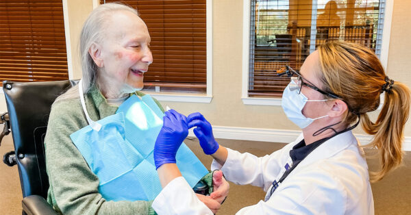 Older woman receiving dental care onsite